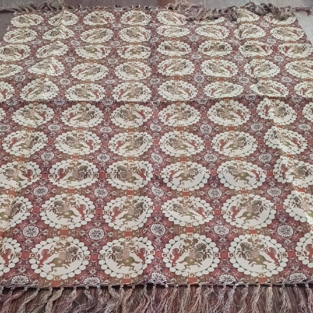 Tatsumara Art Textile, featuring a traditional lion hunt. Brocade. size 32 x 40.
